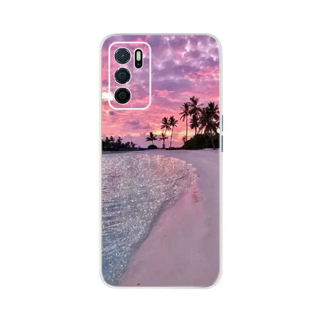 a pink sunset on the beach with palm trees and a pink sky
