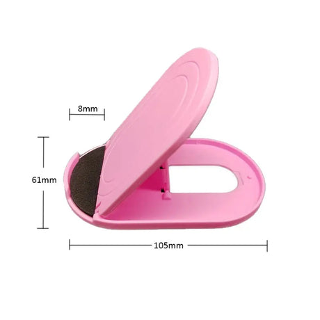 a pink toilet brush with a black brush