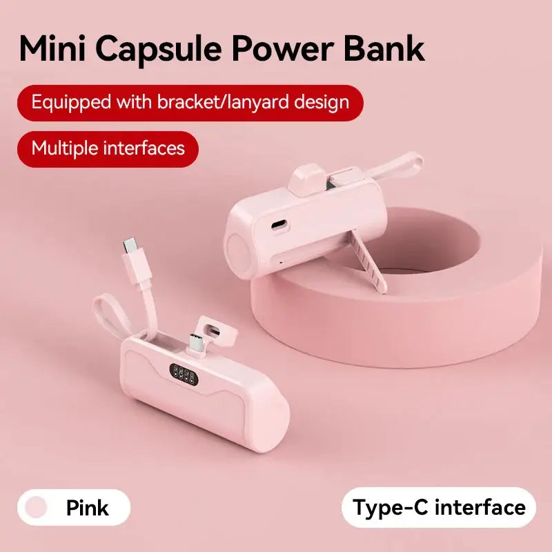 a pink and white device with a pink background