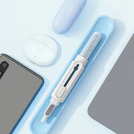 Precision screwdriver with interchangeable bits and a blue handle.