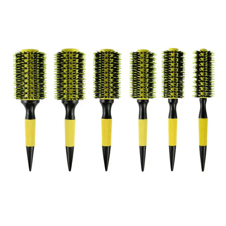 the brush brush is a yellow brush with black handle and black handle