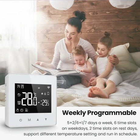 Programmable thermostat with digital display.