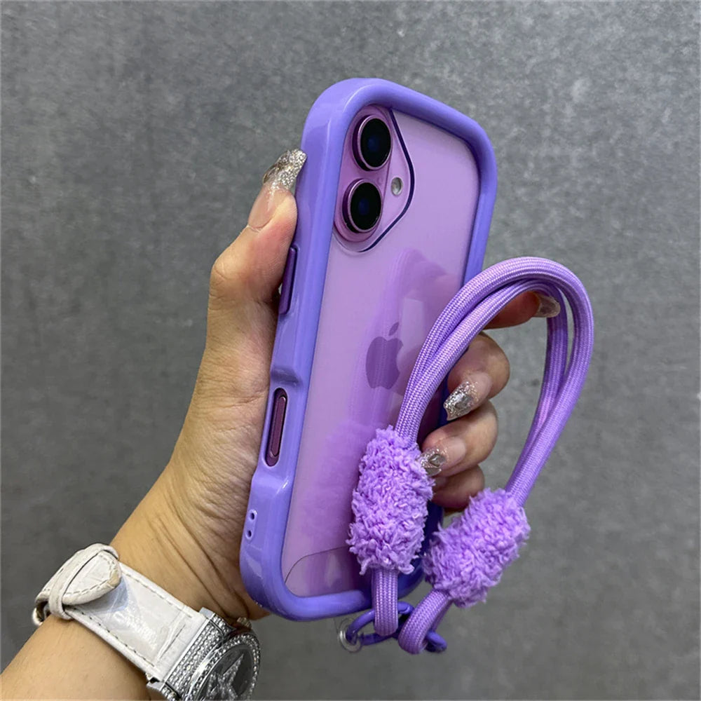 Purple iPhone case with fuzzy strap.