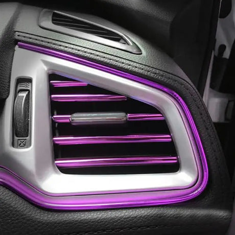 a car with purple lights inside
