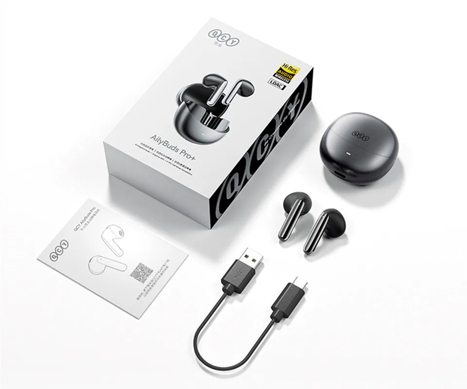 QCY AilyBuds Pro+ wireless earbuds with charging case and accessories.