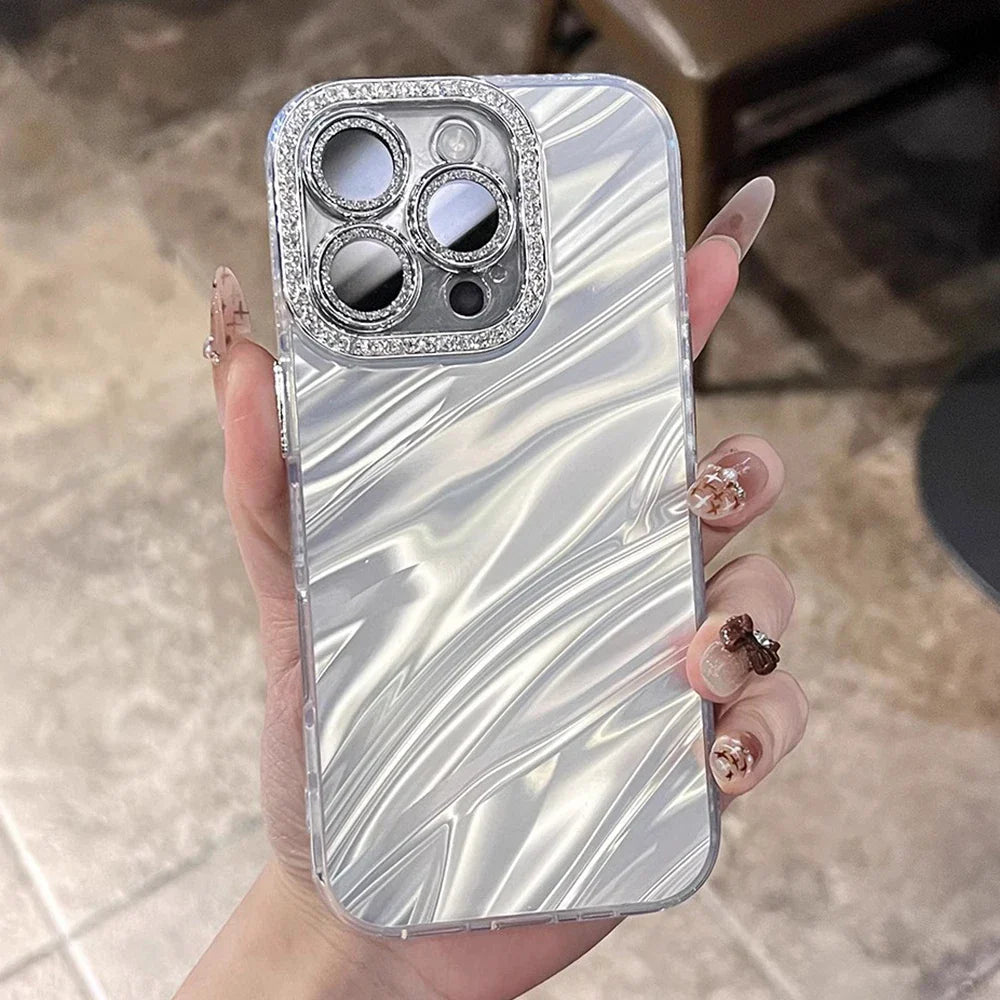 Rhinestone-trimmed, pearlescent phone case.