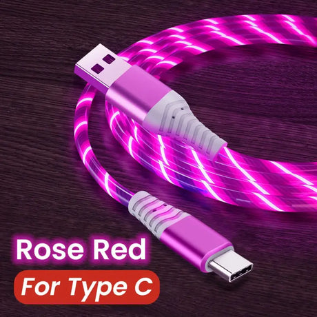 a close up of a pink cable connected to a type c