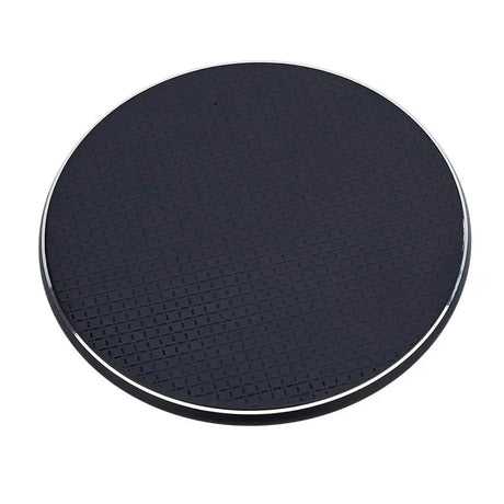 a round black plastic table top with a white base