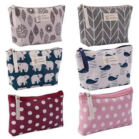 a set of four small pouch bags with different patterns