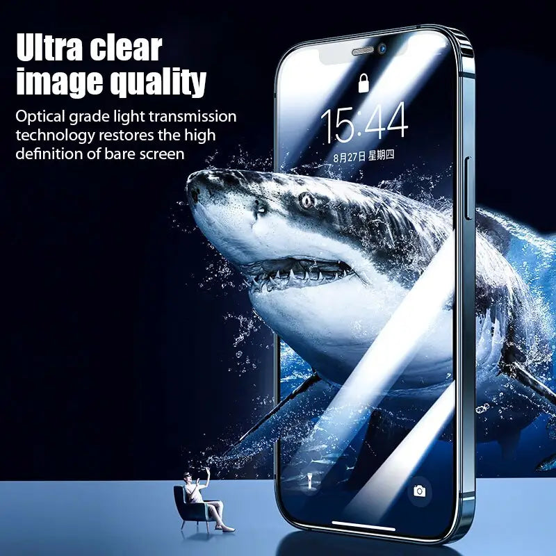 a shark is swimming in the water with a phone
