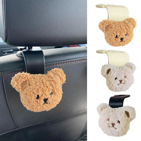 a teddy bear shaped car seat belt