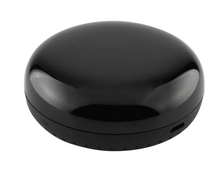 Shiny black puck-shaped device.