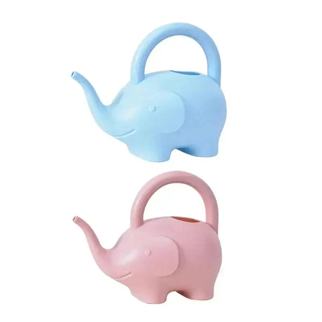 a small elephant shaped teapot with a handle