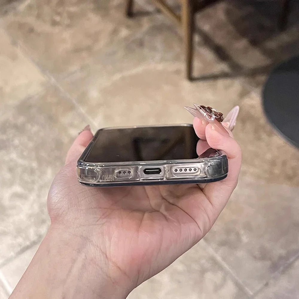 Smartphone in clear case.