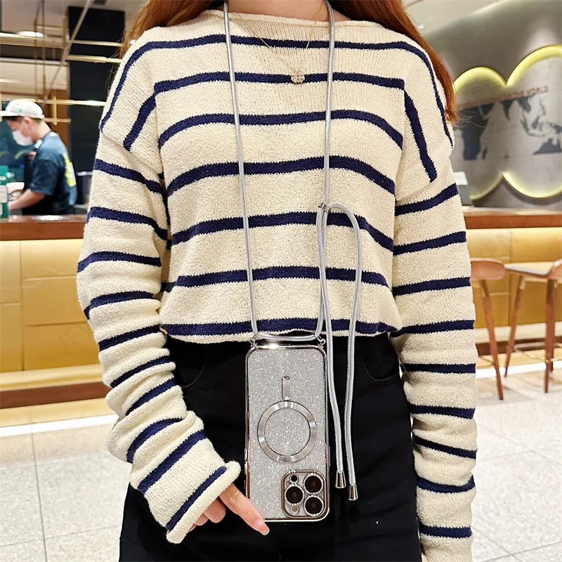 Sparkly phone case with crossbody strap.