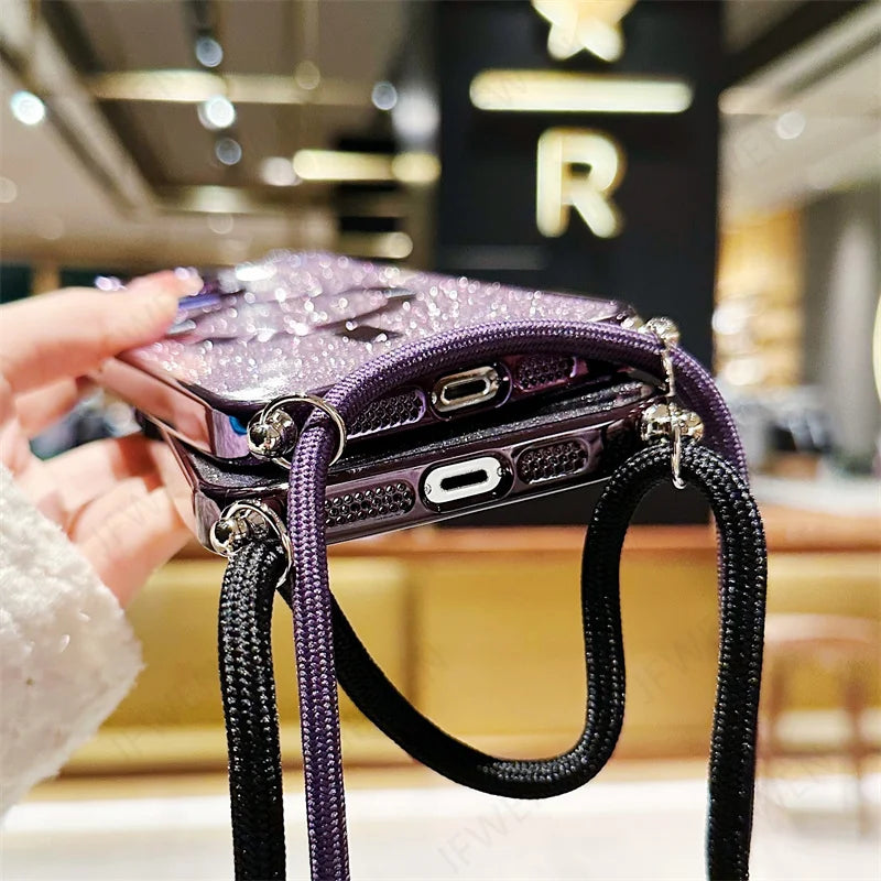 Sparkly purple phone cases with straps.