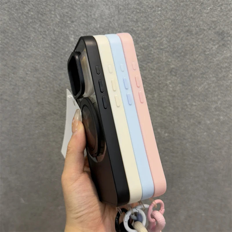 Stacked phone cases in black, white, blue, and pink.
