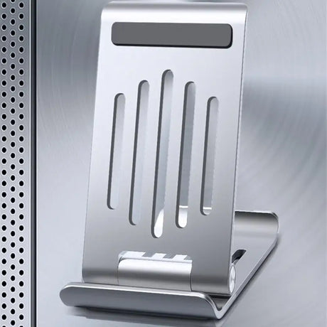 a metal plate with a metal holder on it