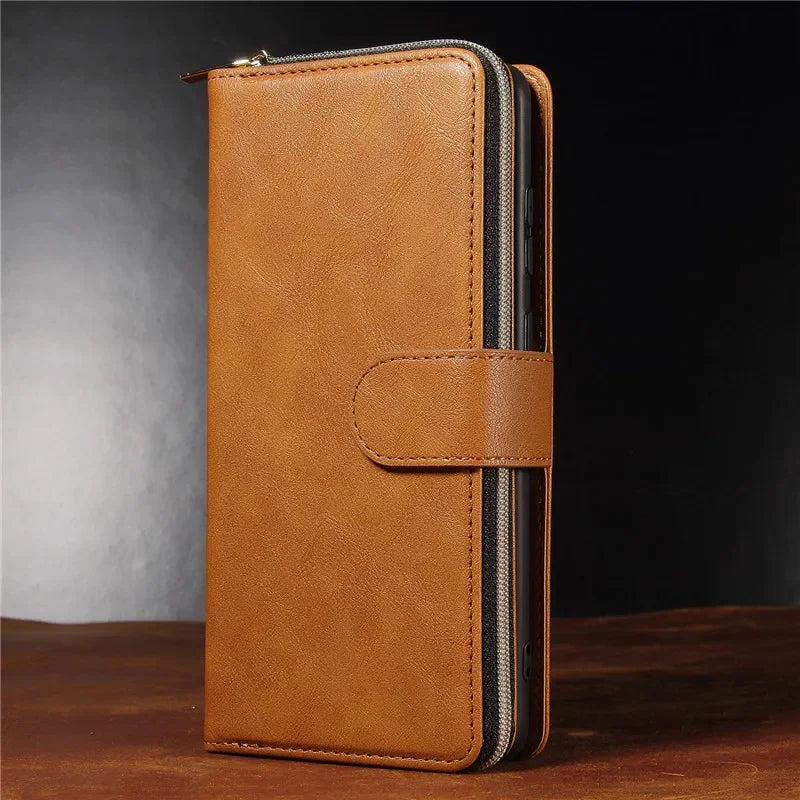Tan leather wallet or phone case with a zipper and snap closure.