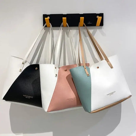 three bags hanging on a wall
