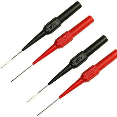 three red and black electrical tools are sitting on a white surface