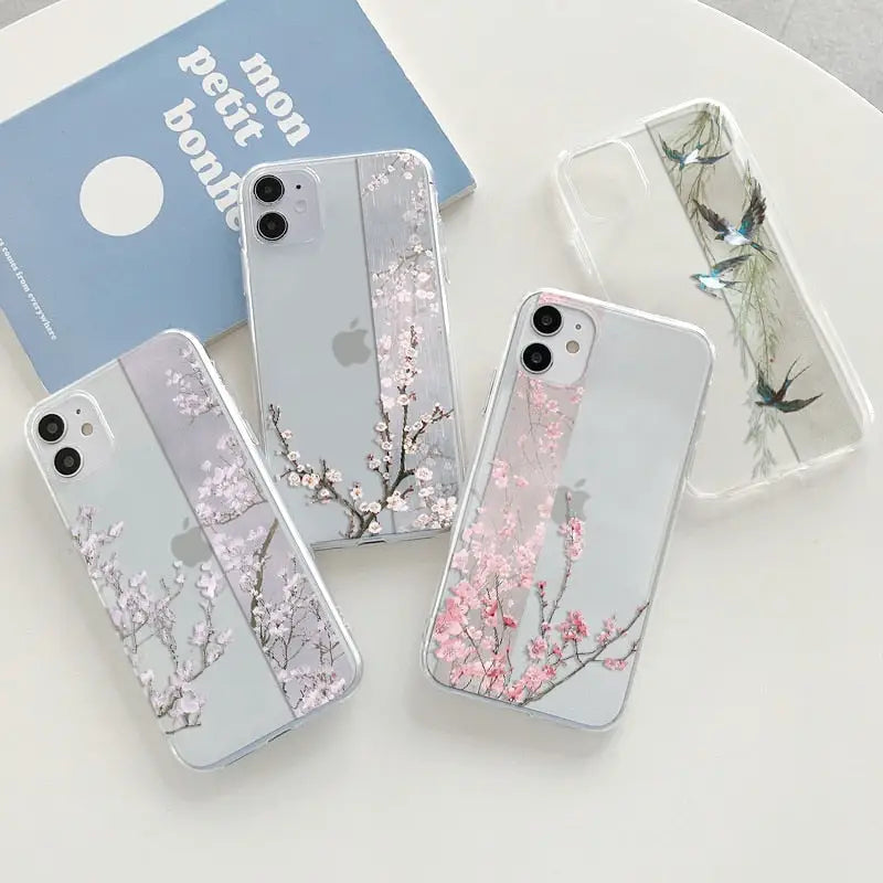 three cases with flowers on them