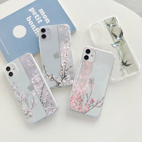 three cases with flowers on them