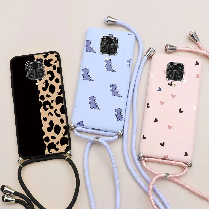 three phone cases with a leash attached to them
