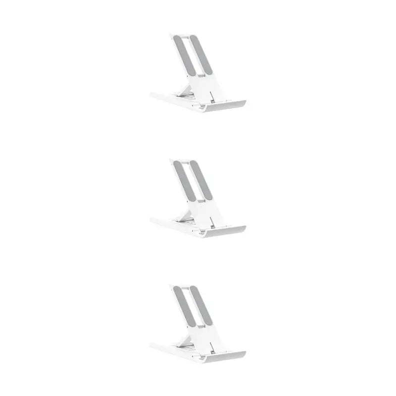 three white standing desks with one standing on the other