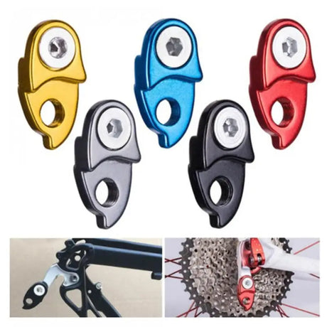 four different colors of bicycle chainrings