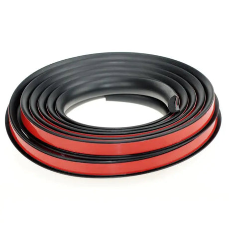 a close up of a red and black rubber strip