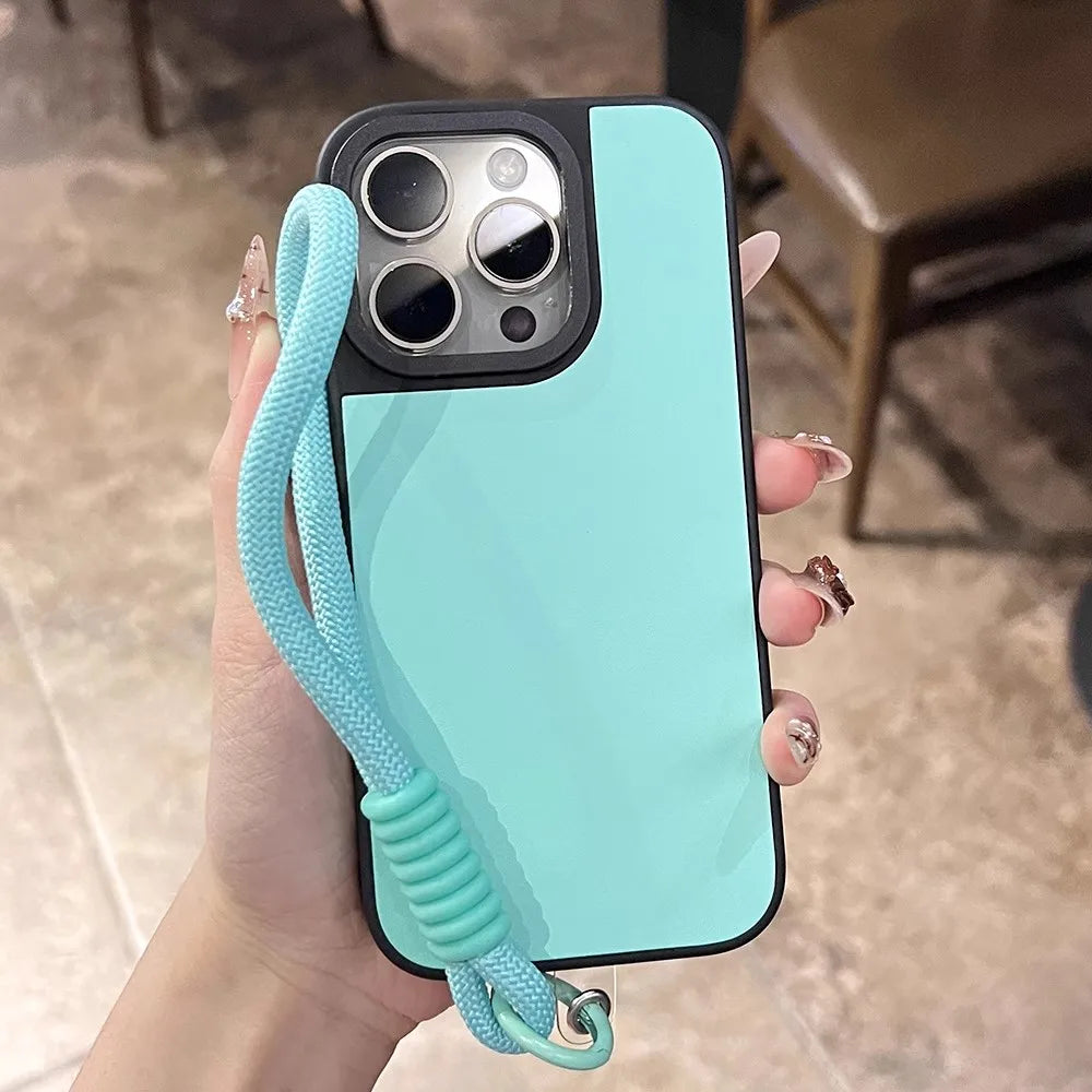 Turquoise phone case with lanyard.