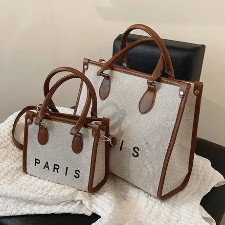two bags with the word paris on them