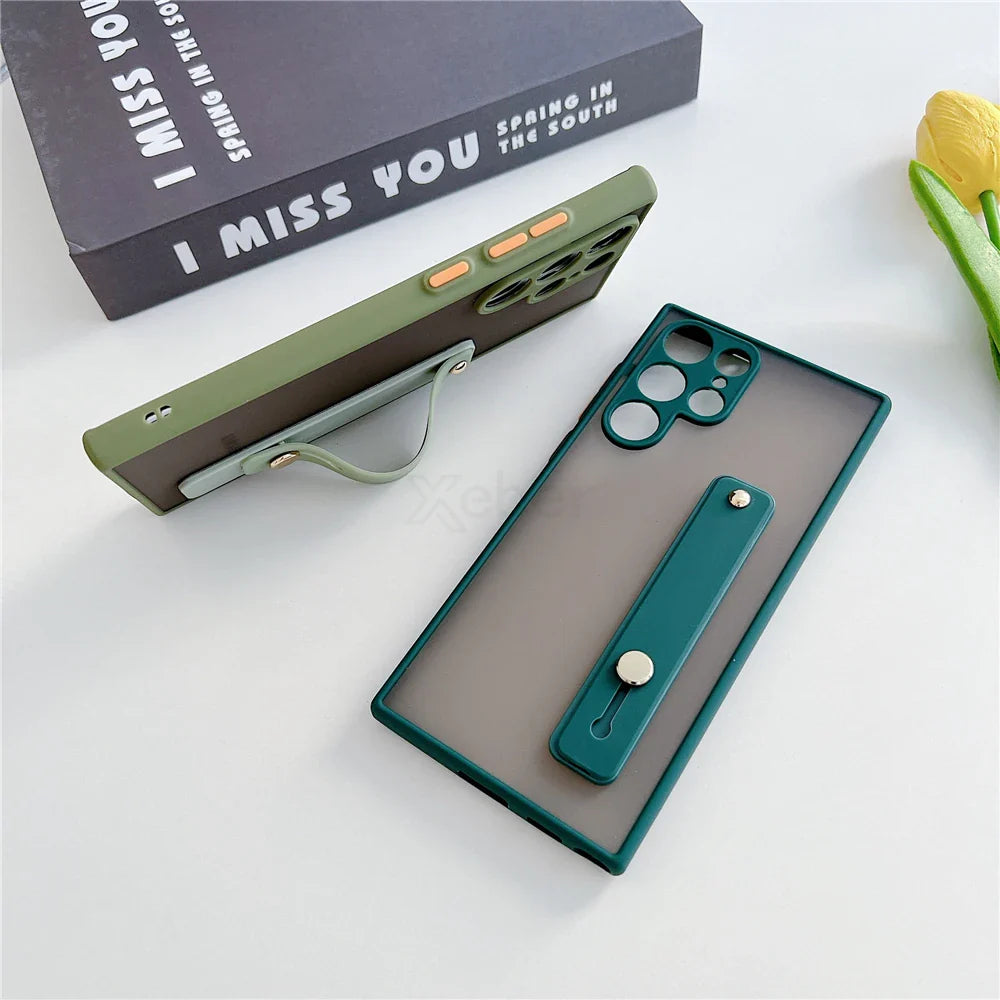 Two different colored frosted silicone phone cases with integrated stands.