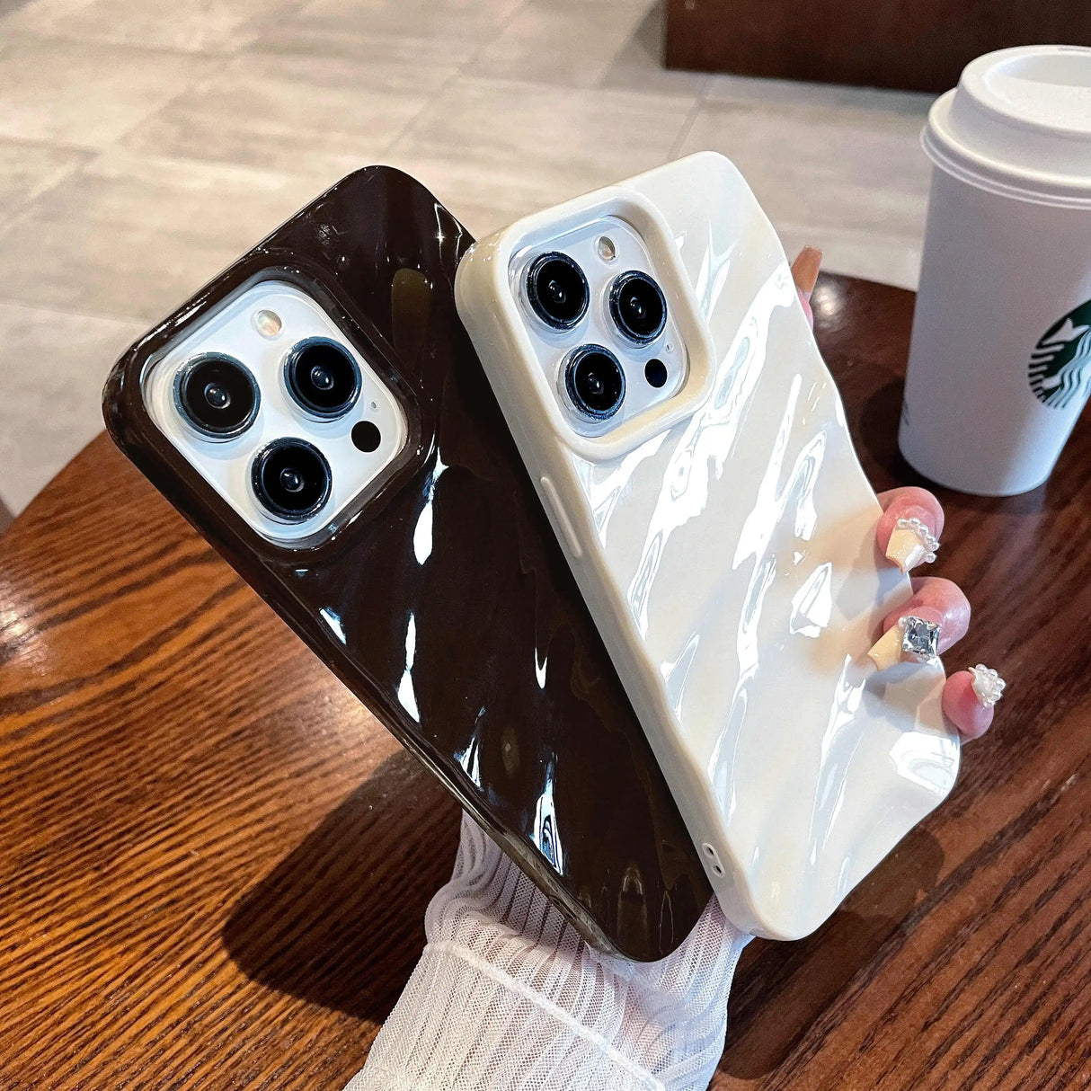 Two glossy iPhone cases.