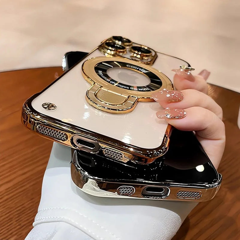 Two gold-trimmed phone cases.