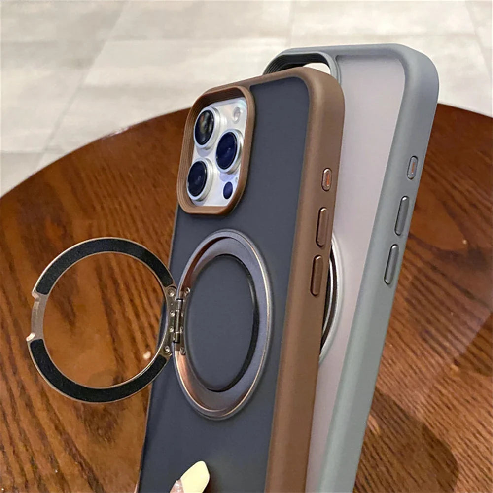 Two iPhone cases with ring stands.