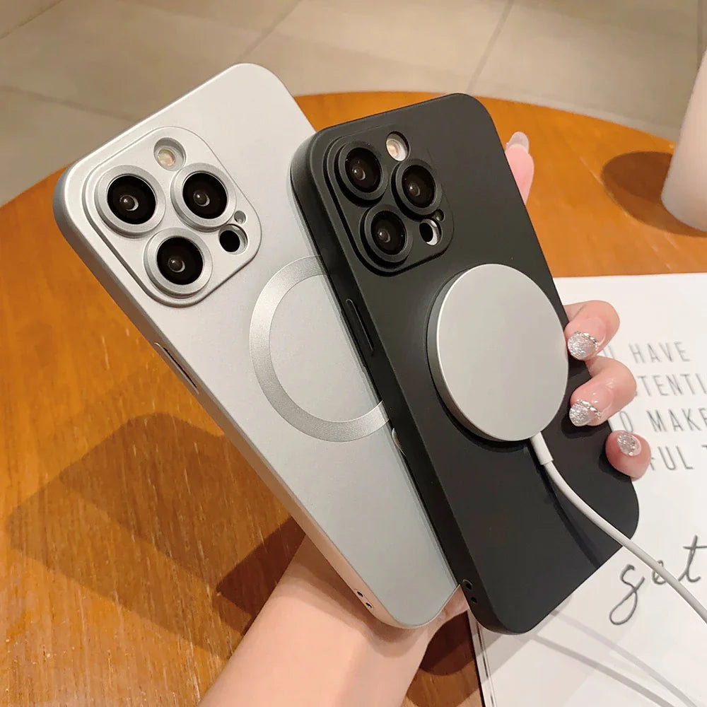 Two iPhones with MagSafe chargers.