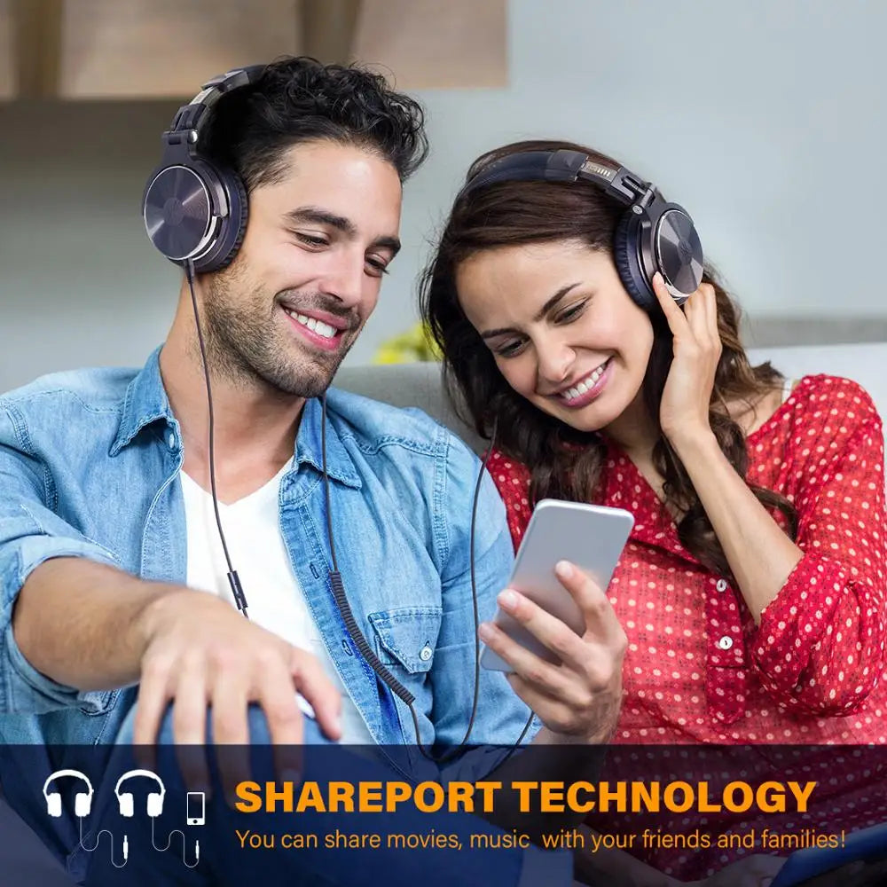 Two people wearing headphones sharing a smartphone.
