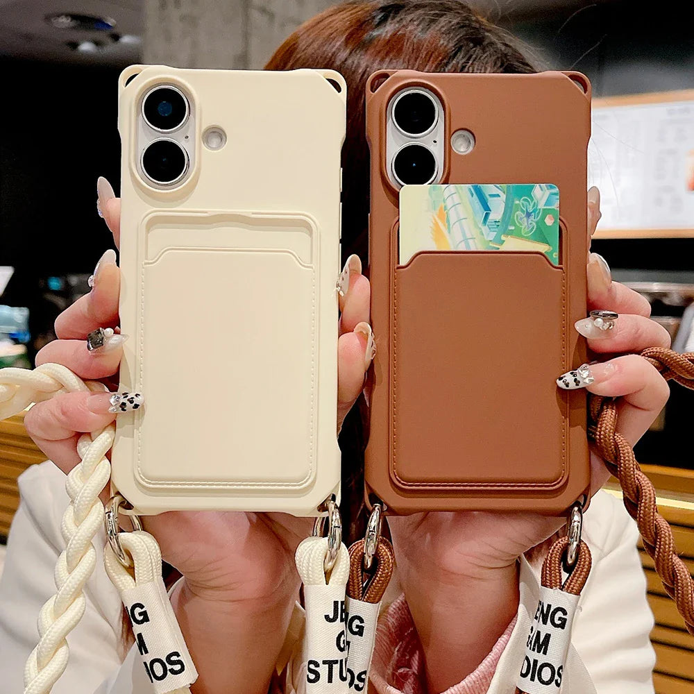 Two phone cases with cardholders and braided straps.