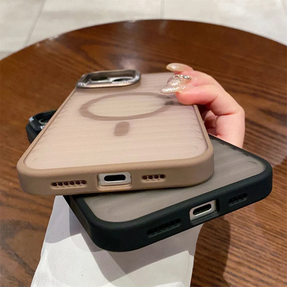 Two phone cases with MagSafe rings.