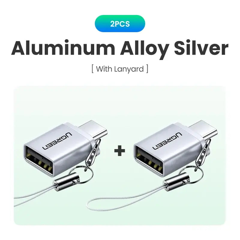 Two silver colored cables connected to a silver colored cable