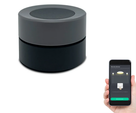 Two-tone cylindrical smart home device.