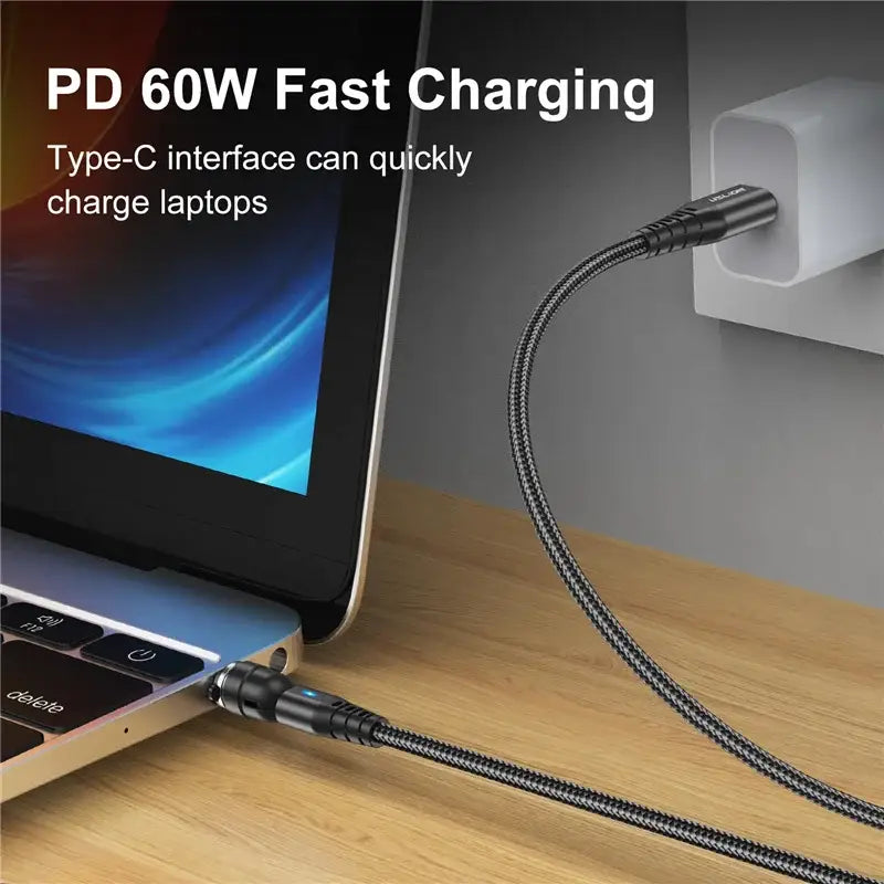 a laptop with a charger attached to it
