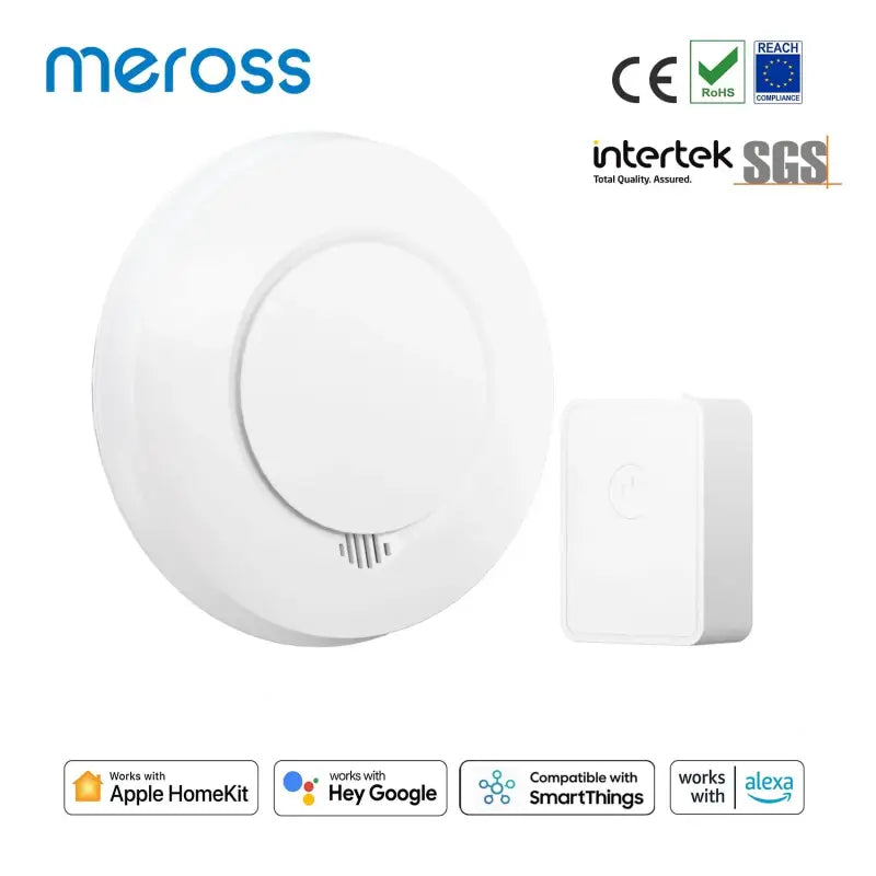 A white alarm with a button and a button on it