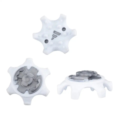 three white plastic gears with a black and white plastic gear