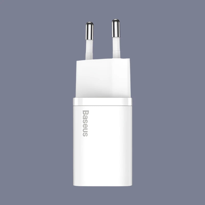 a white charger with two usb ports attached to it