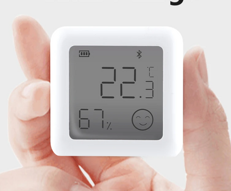 White digital temperature and humidity sensor.
