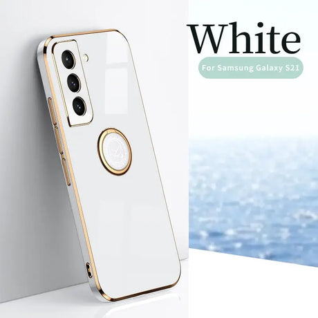 a white and gold iphone case with a white background