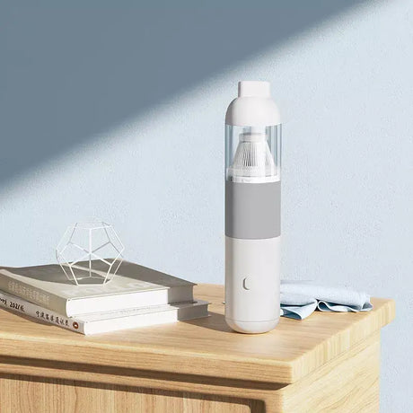 a white and grey water bottle on a wooden table